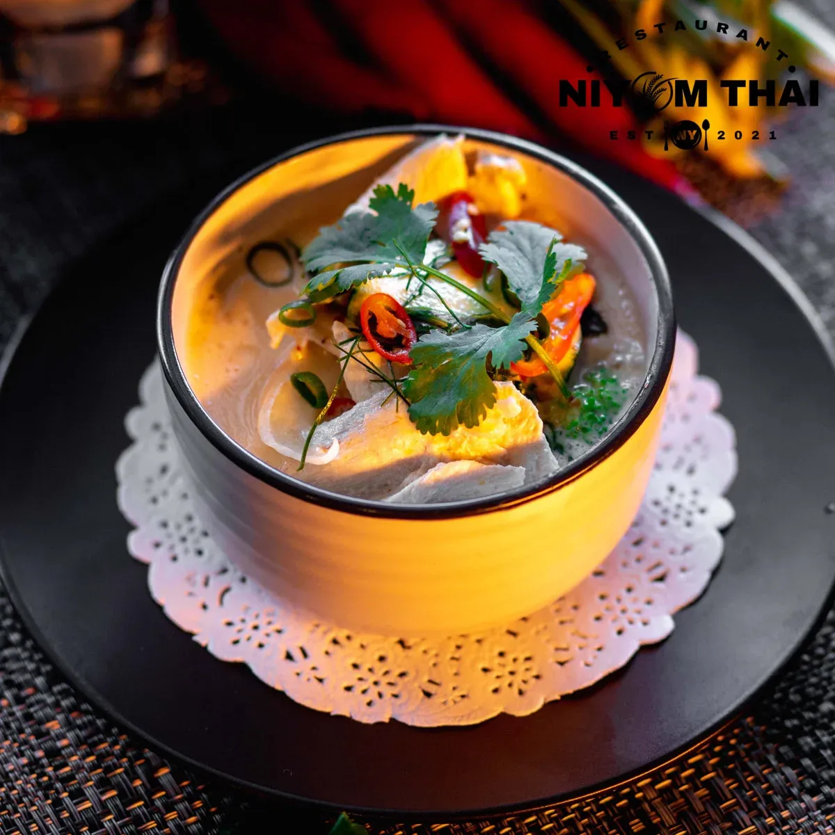 A bowl of tom yum soup.